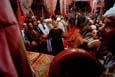 Le guide (murshid) et l'assembl�e des disciples pendant une c�r�monie de dhikr au mouled de Sayyeda Zeinab. Le Caire. The guide (murshid) and the assembly of disciples during a ceremony of dhikr at the mulid of Sayyeda Zeinab.  Cairo.  