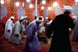 Dhikr dans une tente de confr�rie pendant le mouled de Sayyeda Zeinab. Le Caire. Dhikr in a congressional tent at the mulid of Sayyeda Zeinab.  Cairo.  